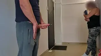 The postwoman caught me jerking off in public near the apartment, she's schoked but she likes to peek
