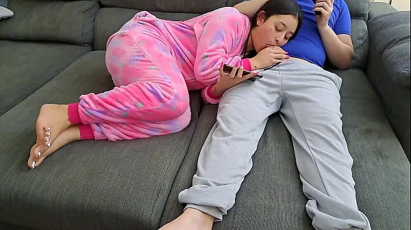 Stepsister sucks stepbrother and eats his sperm while he plays video games