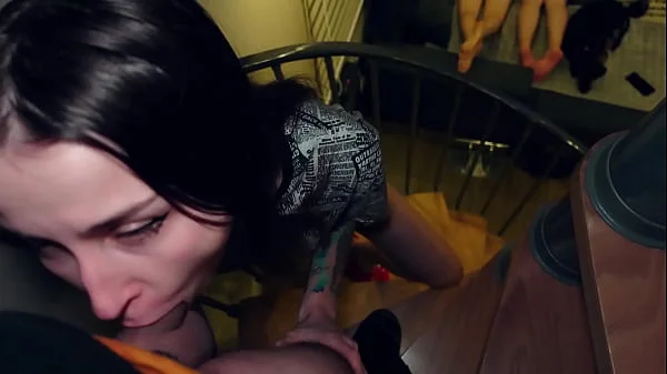 Stepsister gives stepbrother a blowjob while parents watch porn