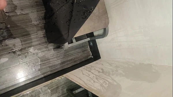 Pissing in a Fitting Room, Using a Pair of Pants