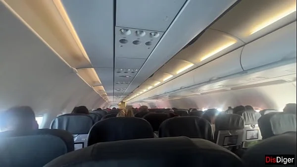 Risky public blowjob on a plane - we got caught!