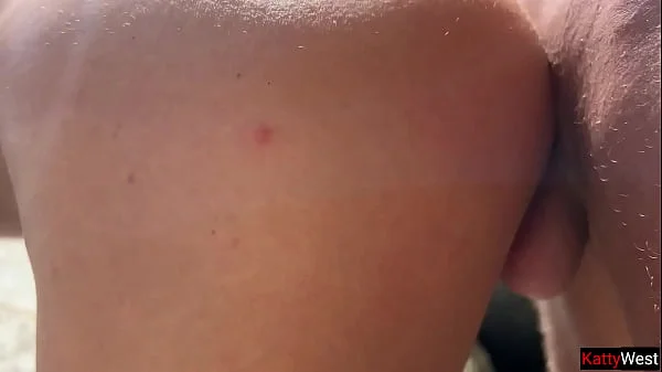 Golden shower on the face of a wet brunette and hot sex on a public beach