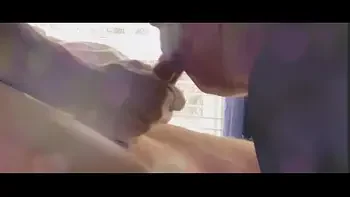 Relaxing deepthroating girlfriend throats a long uncut cock