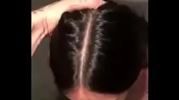 Submissive brunette sucking a giant cock