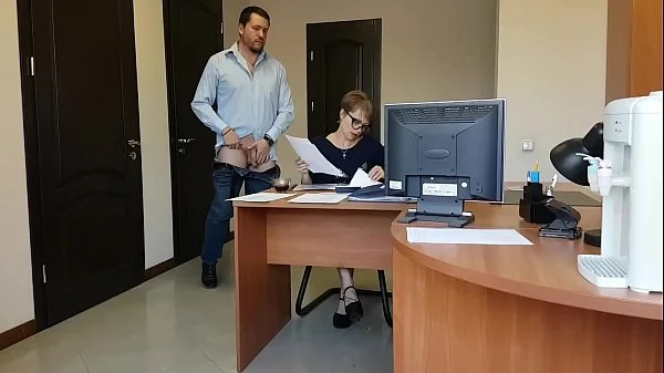 The boss fucks her young milf secretary on the office table