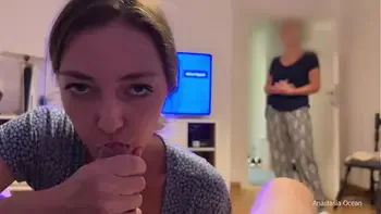 My stepmom caught me giving a blowjob to my boyfriend. We were talking and she watched and he cum.