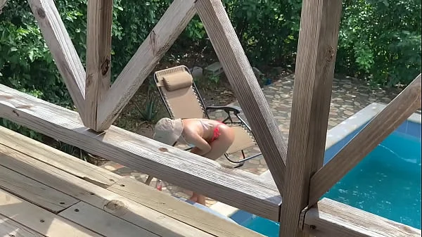 While my wife is tanning in the pool, my sister-in-law fucks me on the balcony