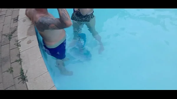 Neighbours wife handjob and finger fucking in swimming pool