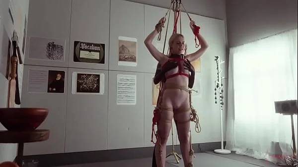 Submissive bondage puppet Rebel Rhyder sucks cock and eats ass in a demented threesome game