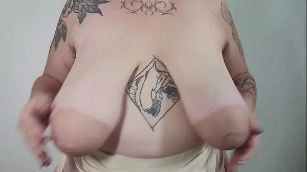 Playing with saggy tits to the sound of sexy sax