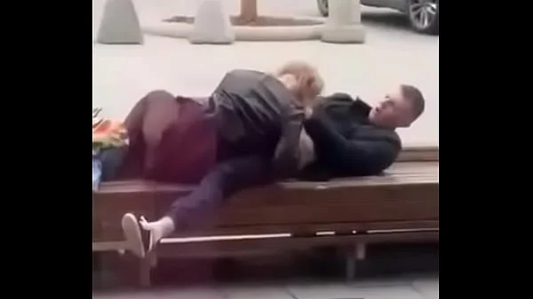 Stupid blonde gives blowjob in public