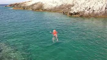 Blue water and a naked girl!