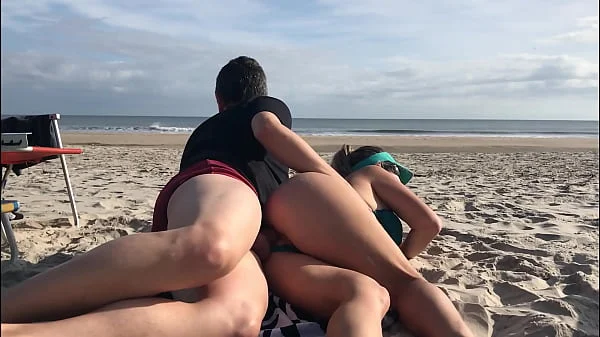 Getting a dick in her ass in front of everyone was the last thing she expected while lying on a public beach...