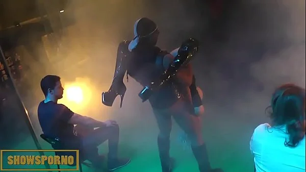 Pornstar interracial fuck on stage with public