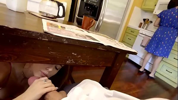 step Daughter sneaks under the table to suck daddy's cock