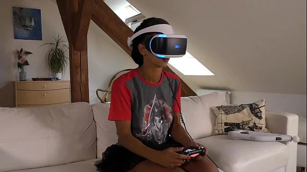 Isabel flashes her pussy and ass under her panties with a tshirt and she has a new game in her Playstation VR but she needs..