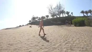 Left the beach naked... (Public nudity)