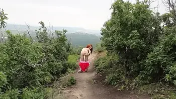 Redhead Fucks Dildo Outside In Dinosaur Costume