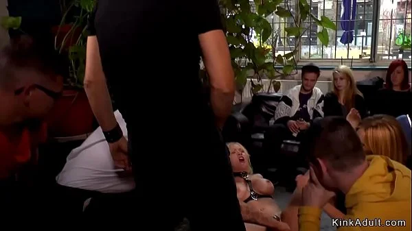 Busty blonde gets gangbang in public