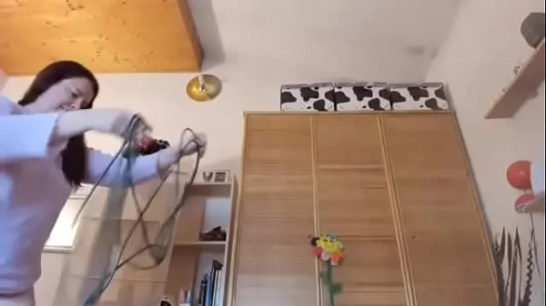 After passing the vacuum cleaner your m. masturbates with the nozzle all inside her pussy