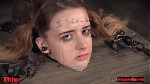 Bdsm babe trapped in a barrel and electrified