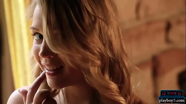 Young blonde hottie Zoey Taylor gives a hot striptease