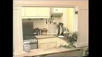 Housewife playing in kitchen