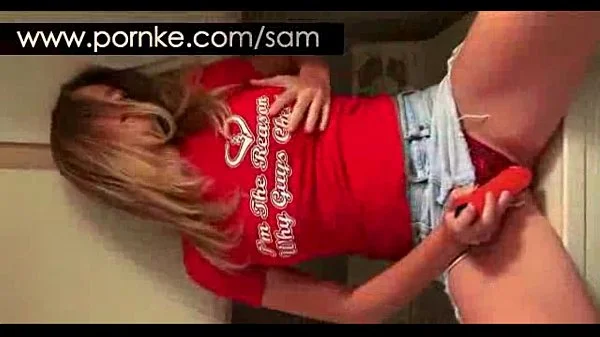 Horny assed teen Samantha Gauge rubs pussy through her red panty