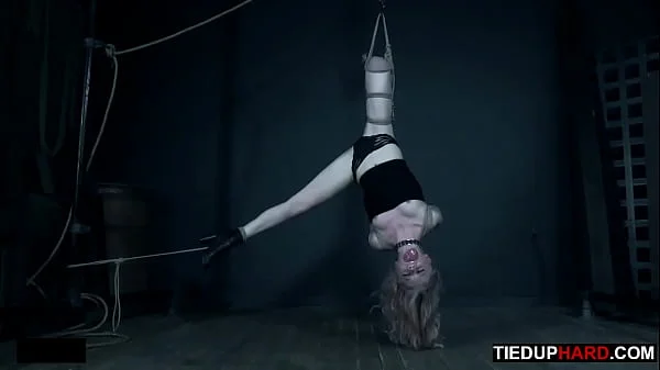 Petite BDSM slave gagged and caned by master