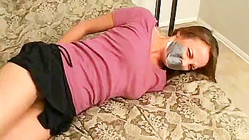 Tied up and Tape Gagged on the bed