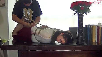 Two Girls Tied One After Other