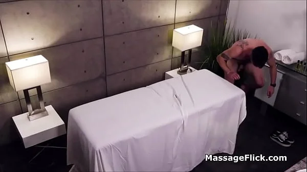 Milking cock under the table during massage