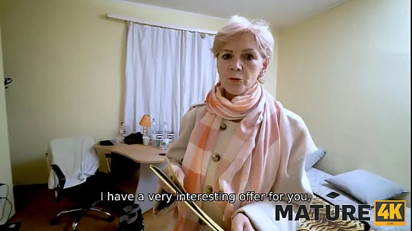 MATURE4K. Sweet mature woman with dyed hair has nothing against quick sex