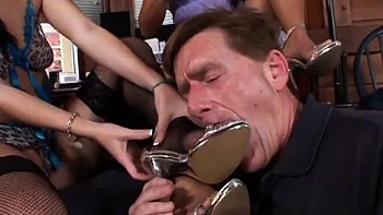 Two girls dominate him with their feet