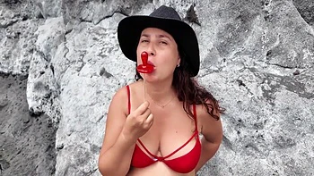 A Stepmom Practices Sucking On A Candy On The Beach. Then Tests Her Skills On Her Stepsons Dick