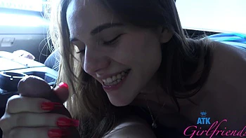 A young couple has sex in the car on a beach, Rose Caarter is driving.