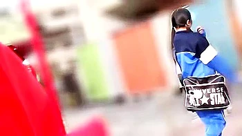 Her hands are tied, her big breasts are exposed, and her legs are spread as she is fingered.