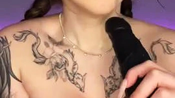 The long-haired nymph in a cat costume provides a deep throat with a yam-sized