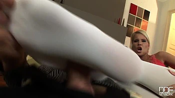 He sprays on her pantyhose