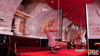 Kiara Lord and Taylor Sands lick pussy while getting fucked at a strip club