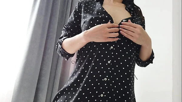 Sexy girl in a dress showed perfect natural tits and masturbates wet pussy