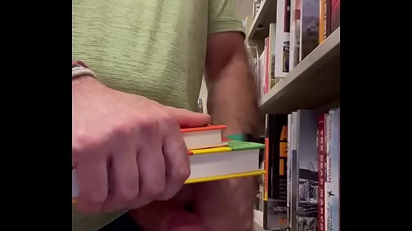 Jerking off at the bookstore. Public masturbation