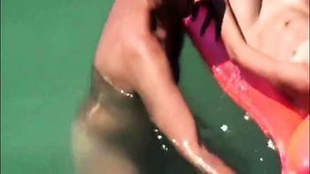 My nudist niece Emma floating in the sea (voyeur)