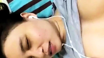 Malaysian Babe in Hijab Masturbates