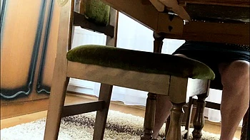 My mother in law spreads her legs under the desk