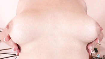 Busty brown-haired chick Mia Fox demonstrates her nice shaved pussy