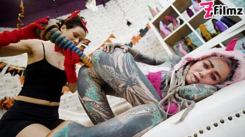 Tattooed girlfriend Anuskatzz and Stacy Bloom are enjoying their toys