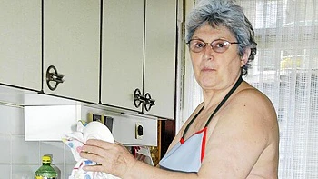 Gorgeous old lady Gerlinde is using a nice cucumber as a dildo