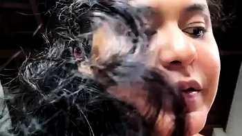 Dorothy Black and Britney use the toy
