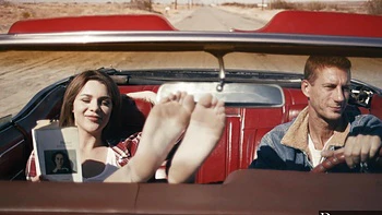 Two sexy babes shared cock in 69 pose while riding a car